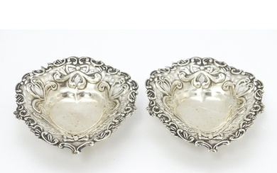 A pair of Victorian silver bon bon dishes of heart form with...