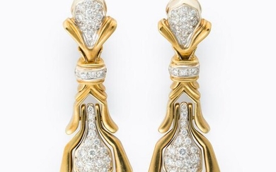 A pair of diamond and gold pendant pendant earrings