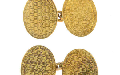 A pair of early 20th century 18ct gold textured cufflinks.