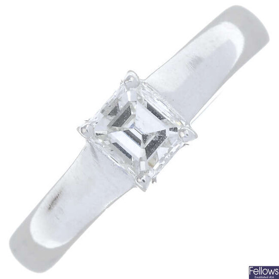 A platinum square-shape diamond single stone ring.