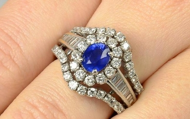 A sapphire and diamond cluster dress ring. Sapphire