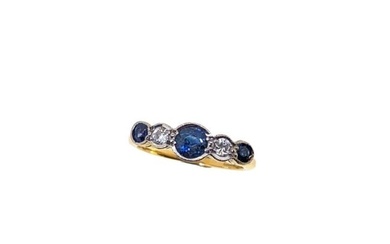 A sapphire and diamond five stone ring