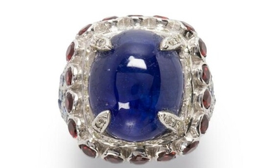 A sapphire, garnet and diamond ring