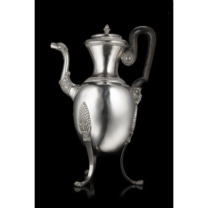 A silver coffe pot with ebonized wooden handle. Genoa, first half of the 19th century. F.B silversmith (h. cm 38)...