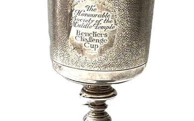 A silver goblet, hallmarked London 1933, with a matted bowl, knopped stem and circular foot