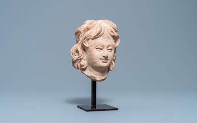 A terra cotta head of a man in Hellenistic style, India, Gandhara, 2nd/4th C.