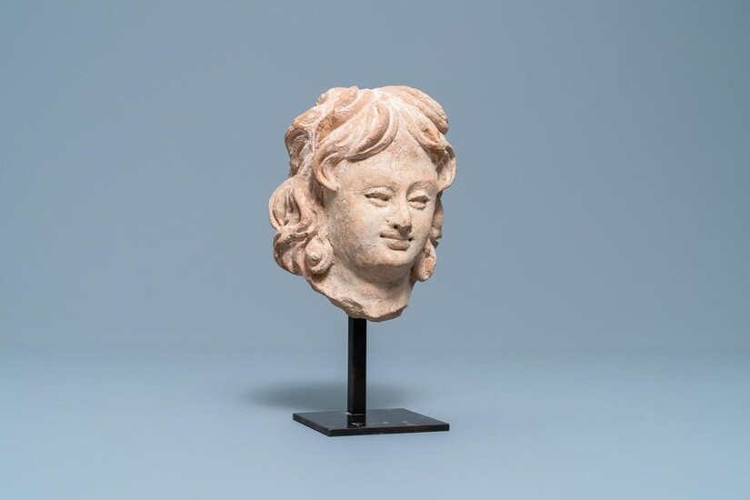 A terra cotta head of a man in Hellenistic style, India, Gandhara, 2nd/4th C.