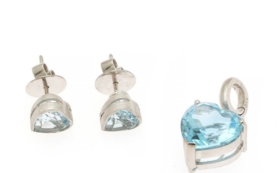A topaz jewellery set comprising a hinged pendant and a pair of ear studs each set with a heart-shaped topaz, mounted in 18k matted white gold. (3)