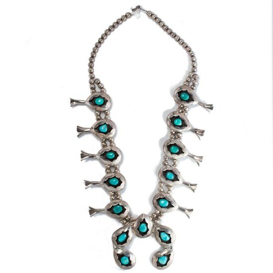 A turquoise and silver necklace