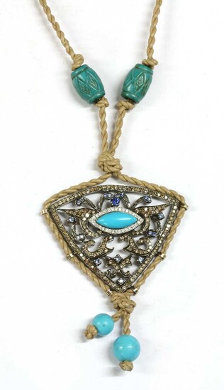 A white gold turquoise, diamond and sapphire pendant