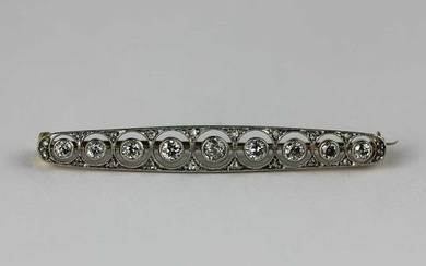 A yellow and white gold and diamond brooch
