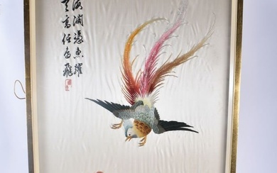 AN EARLY 20TH CENTURY CHINESE SILK EMBROIDERED PANEL Late Qing/Republic, depicting a bird attacking