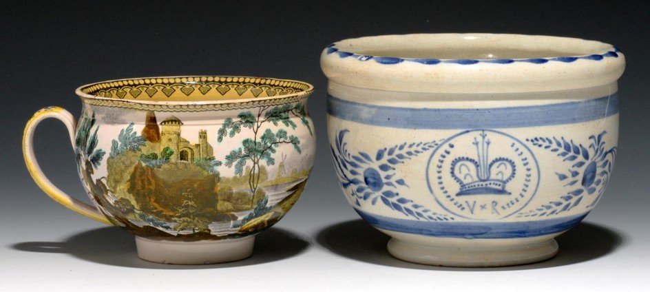 AN EARTHENWARE COACH POT, C1840 painted in blue with crown, ...