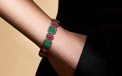 AN EMERALD, RUBY AND DIAMOND BRACELET set with a r ...