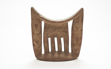 AN ETHIOPIAN KAMBATTA CARVED NECKREST LATE 19TH CENTURY/ EARLY 20TH CENTURY