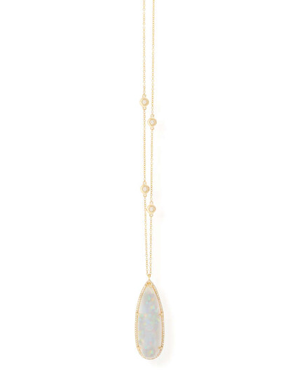 AN OPAL AND DIAMOND PENDANT ON CHAIN The...