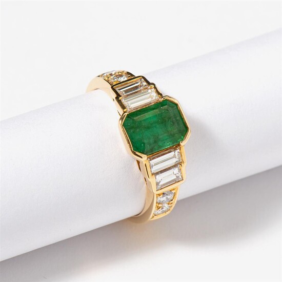 (-), An 18 carat yellow gold, emerald and...