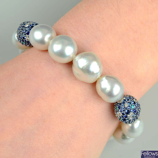 An 18ct gold South Sea baroque cultured pearl, diamond, sapphire and paraiba tourmaline 'Midnight Sky' bracelet, by Mikimoto.