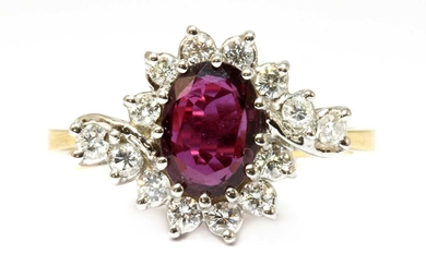 An 18ct gold ruby and diamond crossover cluster ring