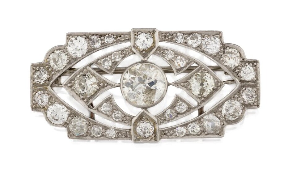 An Art Deco diamond rectangular panel brooch, with central millegrain-set old-brilliant-cut diamond weighing approximately 1.03 carats, within diamond pierced openwork geometric pattern surround, c.1930, approx. 1.8 x 3.7cm