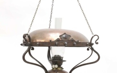 An Arts and Crafts hanging copper oil lamp