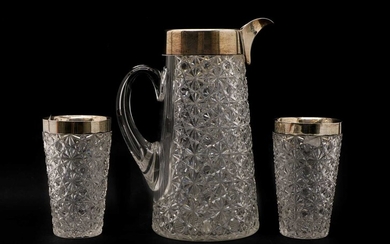 An Edwardian silver mounted and cut glass lemonade jug