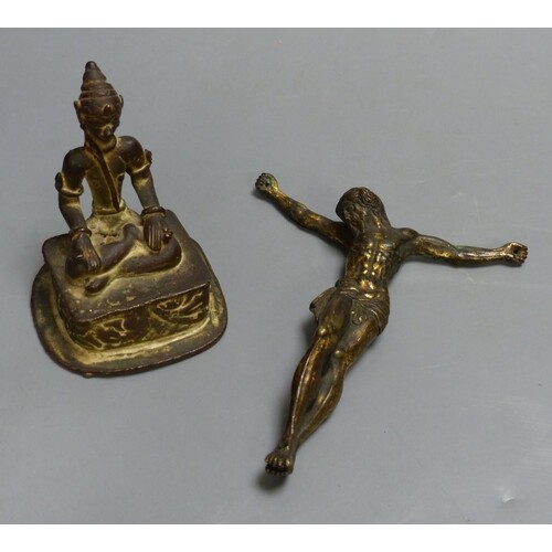 An Indian Buddhist figure and a gilt bronze Corpus Christi, ...