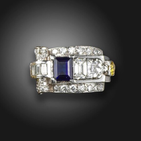 An Odeonesque sapphire and diamond ring, set with an emerald-cut...