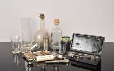 An assortment of Medical Instruments and Glassware