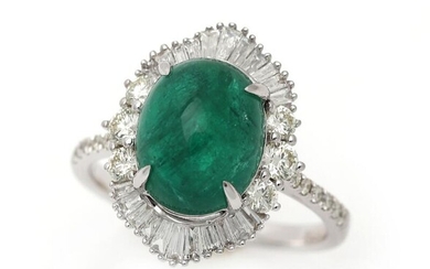 NOT SOLD. An emerald and diamond ring set with an emerald weighing app. 4.21 ct. encircled by numerous diamonds, mounted in 18k white gold. Size app. 53.5. – Bruun Rasmussen Auctioneers of Fine Art