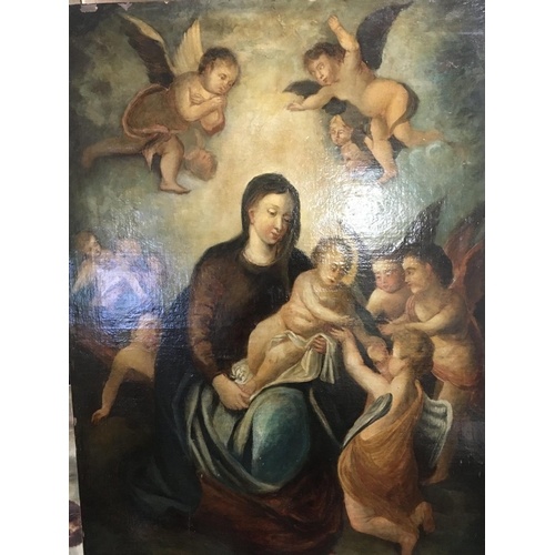 An unframed oil painting on canvas of the Madonna and child ...