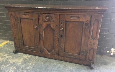 Antique Rustic Oak Dresser, incorporating early elements, carved with recessed panel work, fitted with a short drawer & two doors, w...