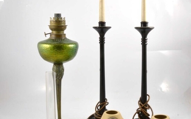 Art Nouveau style oil lamp; and pair of wooden table lamps.
