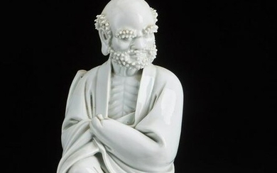 Arte Cinese A Blanc de Chine porcelain figure of a