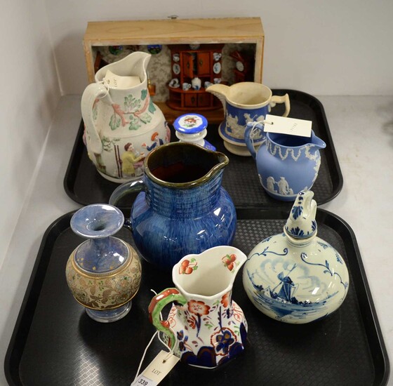 Assorted ceramics jugs and other items.