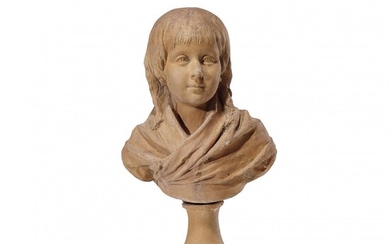 BUSTE EN TERRE cuite 19e siècle Buste en terre cuite représentant un jeune garçon. Légers...