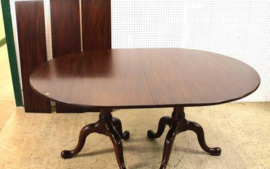 Beautiful Henkel Harris solid mahogany oval dining room table with (3) 12" leaves