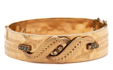 Bracelet jonc ouvrant en or jaune (750) 18K ornée en applique de torsades et de...