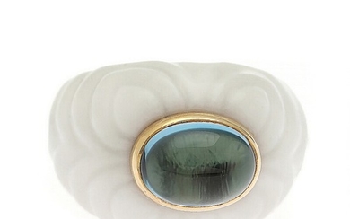 Bulgari: A “Chandra” ring set with a cabochon topaz, mounted in porcelain. W. app. 17 mm. Size app. 52.