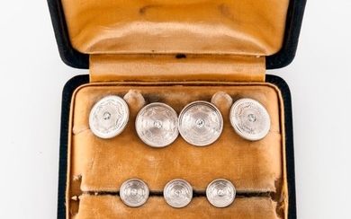 Button set with circular plates with concentric circles...