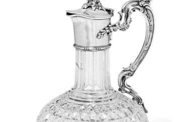 Carl Fabergé: A Russian cut crystal liqueur decanter with silver top and handle, gilt interior. 84 standard. H. 20 cm.