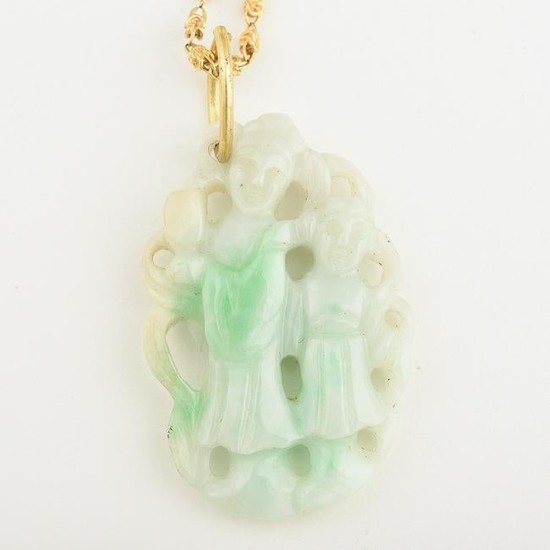 Carved Jade, Yellow Gold Pendant Necklace.