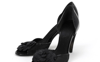 Chanel A pair of black stilettos of patent leather and satin with...