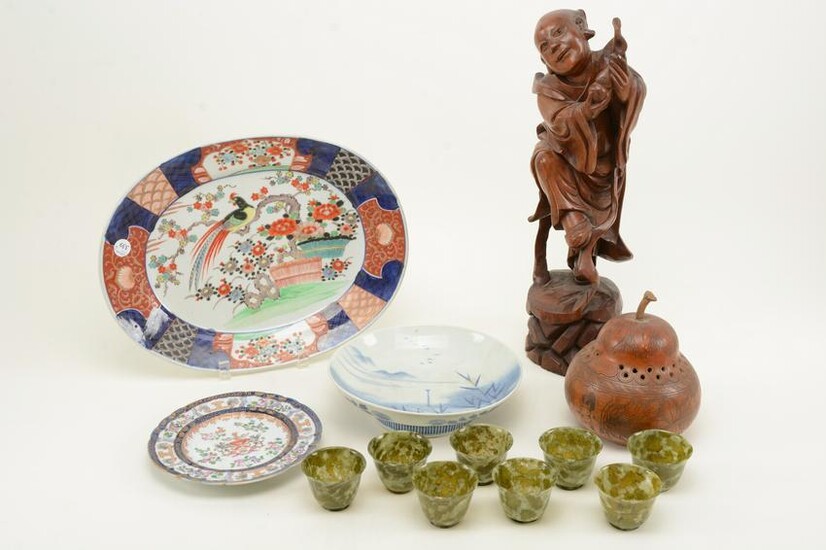 Chinese and Japanese porcelain and carvings. Includes