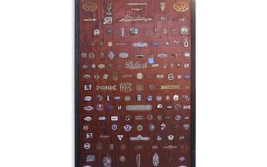 Collection of Marque Grille and Radiator Badges on Board
