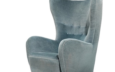 Danish furniture design: Wing chair of curved shape, upholstered with blue velour, beech legs, 1940s.