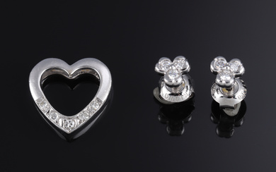 Diamond heart pendant and diamond earrings of 14 and 18 kt. white gold (3)