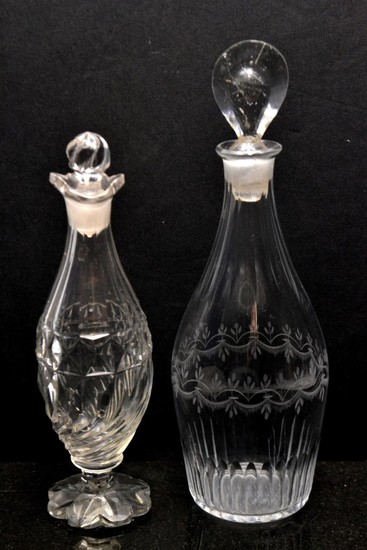 Early 18th century vinegar glass bottle and an oil bottle, l...