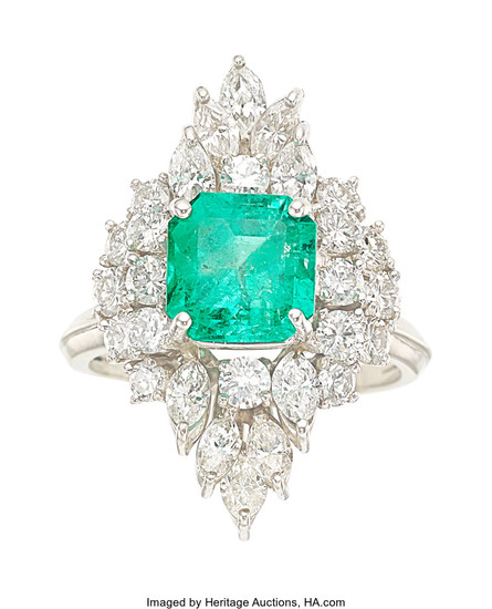 Emerald, Diamond, Platinum Ring The ring centers a...