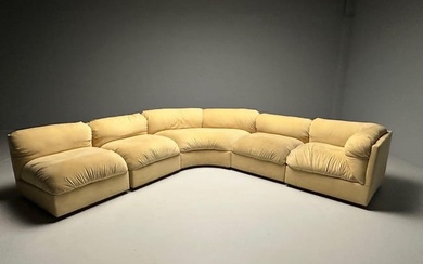 Erwin-Lambeth Labeled Sofa. A large center demi lune settee flanked by two pair of side chairs.